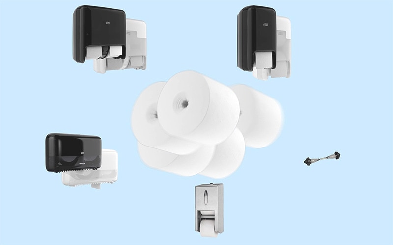 Image of one wide range of Tork OptiServe commercial coreless toilet paper dispensers and coreless toilet rolls