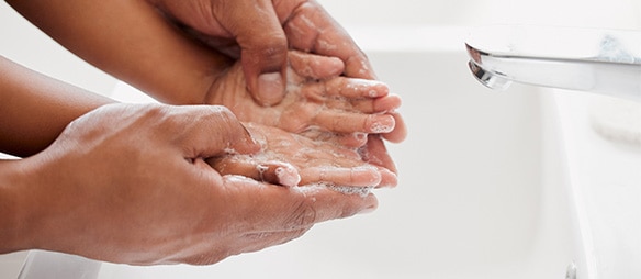 Child and parent washing hands​
