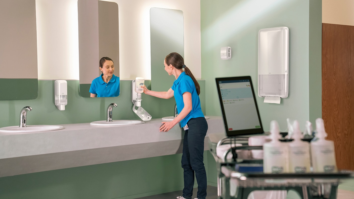 Cleaner refilling soap in white dispenser 