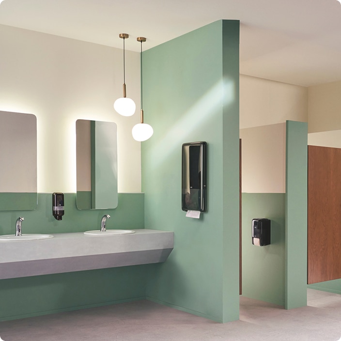 Restroom featuring IoT enabled Tork dispensers that display realtime refill status data Restroom featuring IoT enabled Tork dispensers that display realtime refill status data