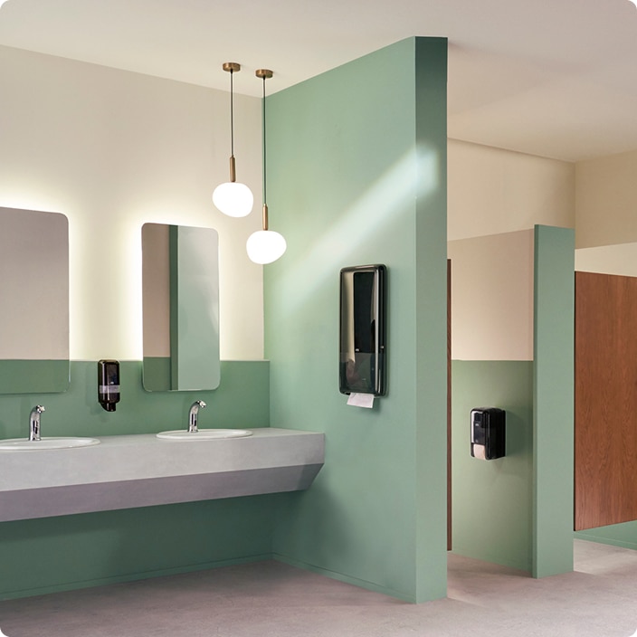 Restroom featuring IoT enabled Tork dispensers that display realtime refill status data Restroom featuring IoT enabled Tork dispensers that display realtime refill status data