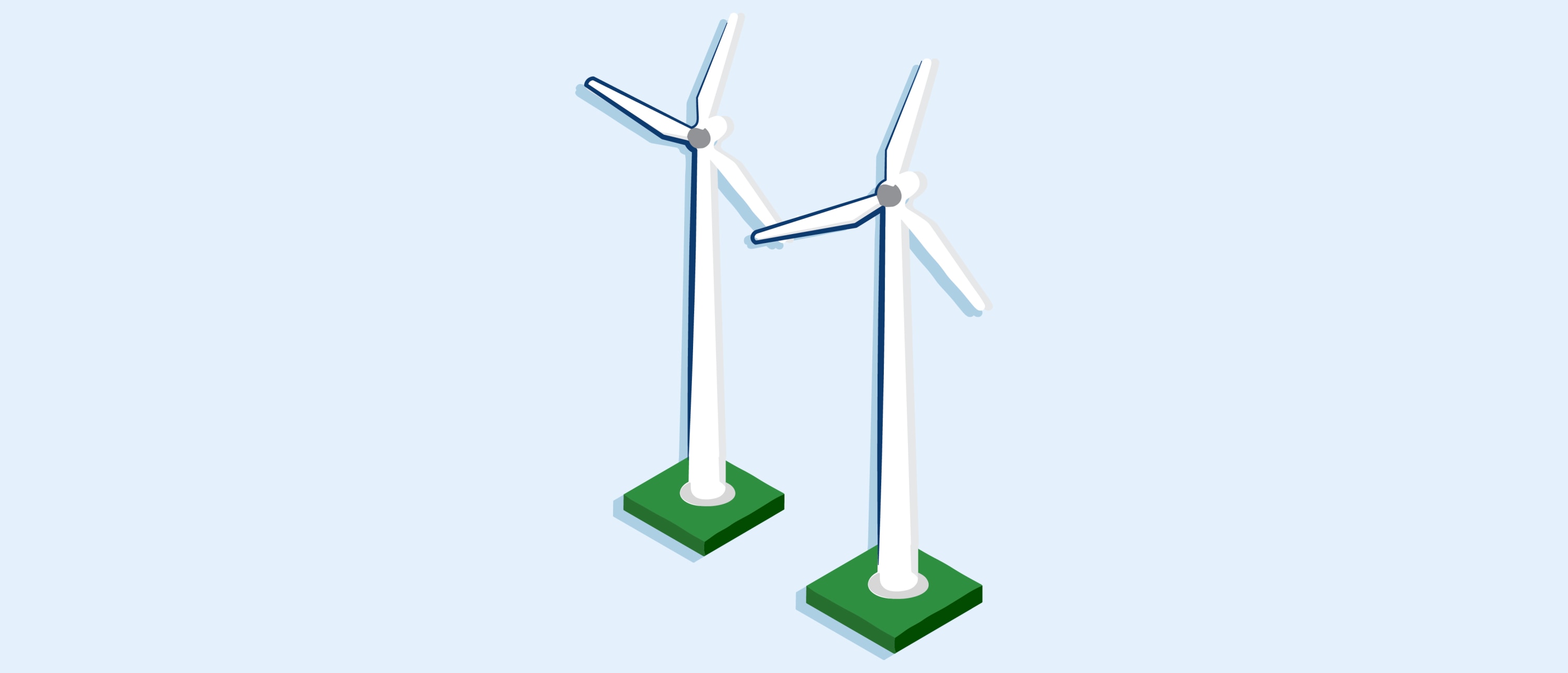 Two white wind turbines with three-blade rotors mounted on grass against a pale blue background.