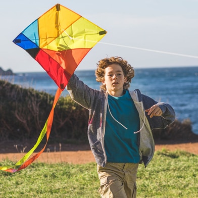 Little boy with a kite in his hand