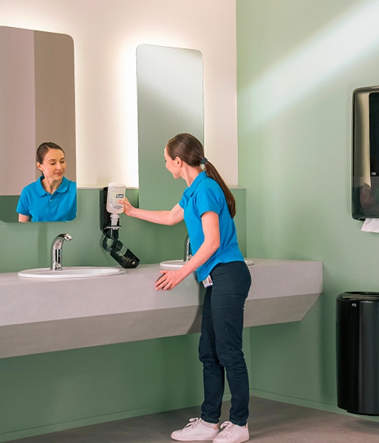 Cleaner refilling soap in black dispenser 