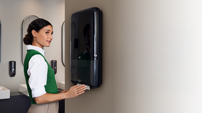 The range of black Tork PeakServe dispensers with one refill The range of black Tork PeakServe dispensers with one refill