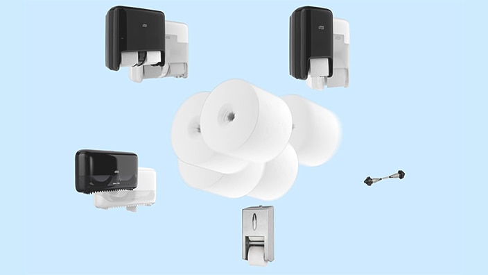 Image of one wide range of Tork OptiServe commercial coreless toilet paper dispensers and coreless toilet rolls