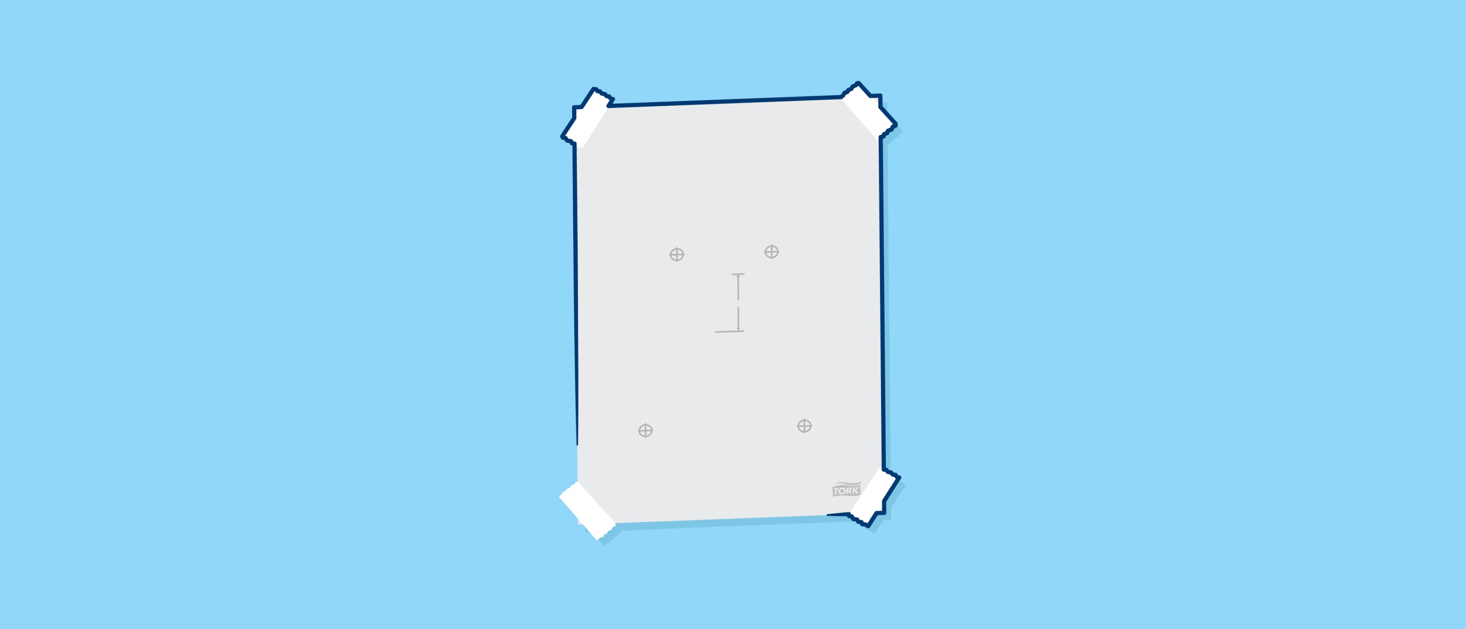 Mounting template taped at the corners to a blue wall, showing printed drill-hole guides and alignment marks for installing a centerfeed dispenser.