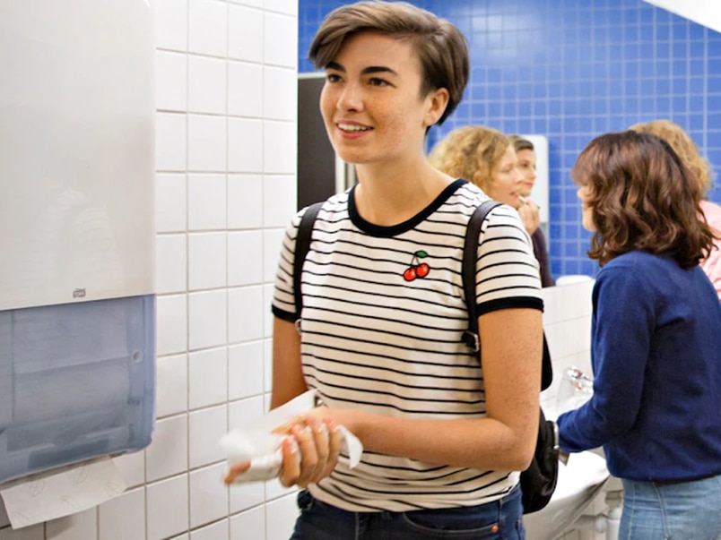 Women in a public washroom