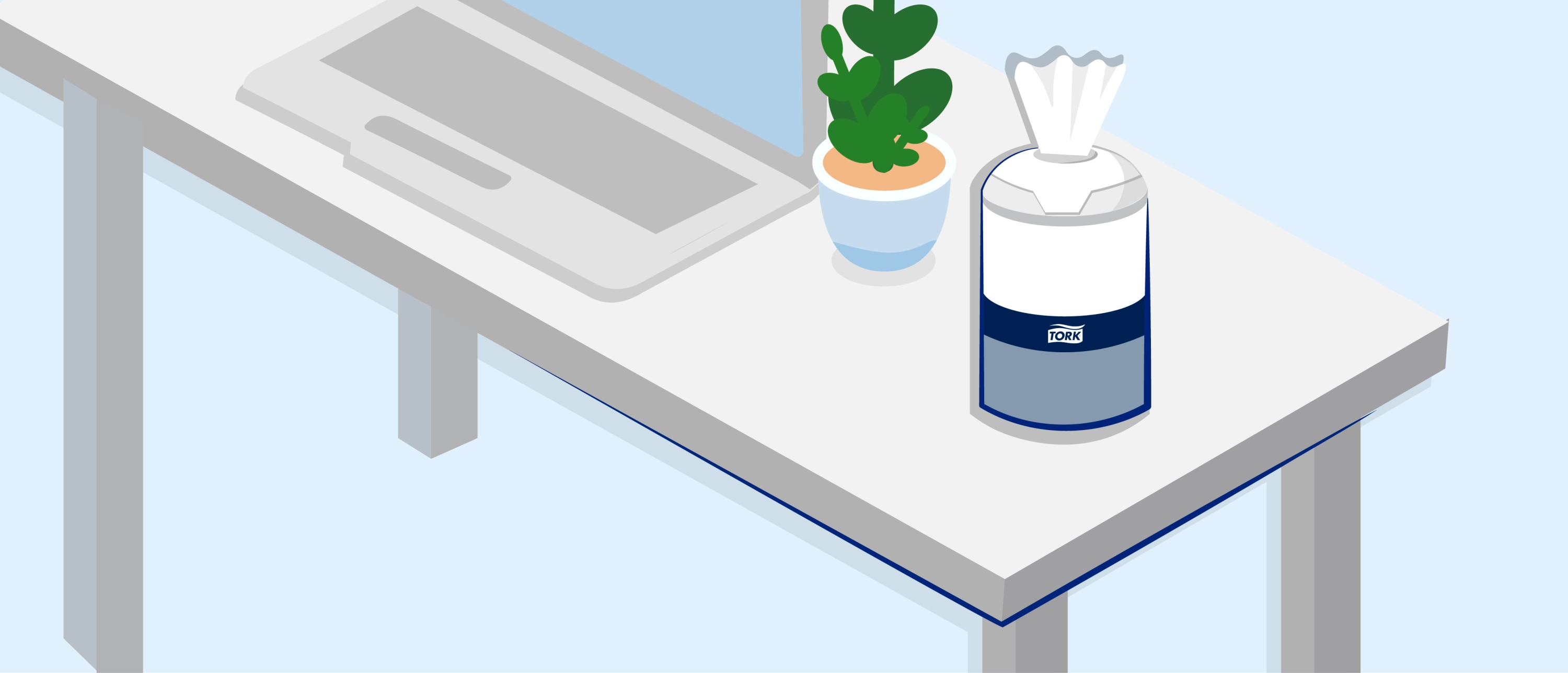 Desk with a laptop, a small potted plant, and a container of Tork disinfectant wipes with one wipe partially pulled out.
